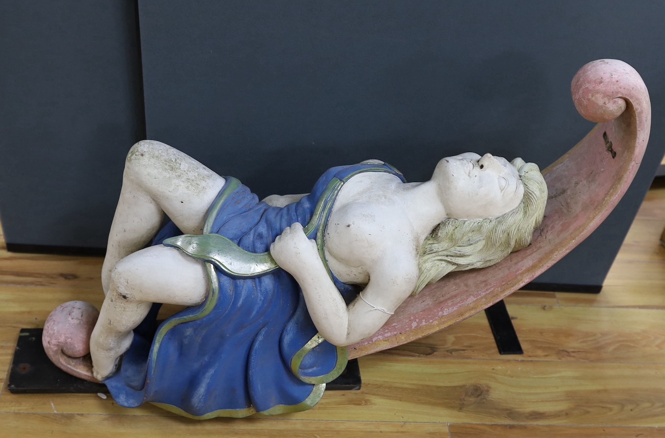 A painted wood and gesso female figurehead reclining - 74cm deep, 93cm high